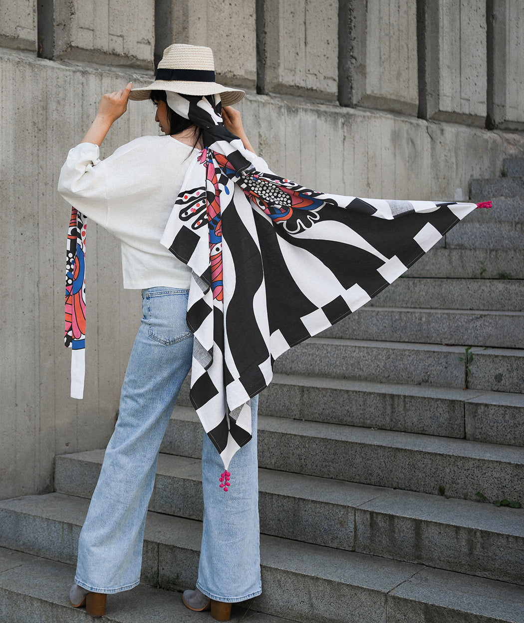 Artelie Haname Panorama scarf with pom-pom corners
